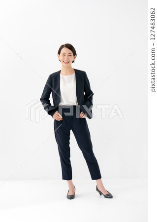 Woman in suit, full body 127483062