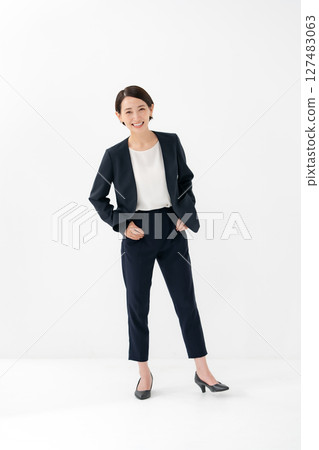 Woman in suit, full body Woman in suit, full body 127483063