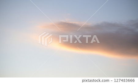 Clouds floating in the setting sun 127483666