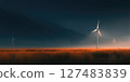 Wind turbines in the field at sunset/sunrise. Vast meadow with tall wind turbines 127483839
