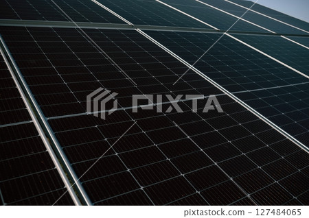 Close-up view of solar cell farm power plant eco technology Close-up view of solar cell farm power plant eco technology 127484065