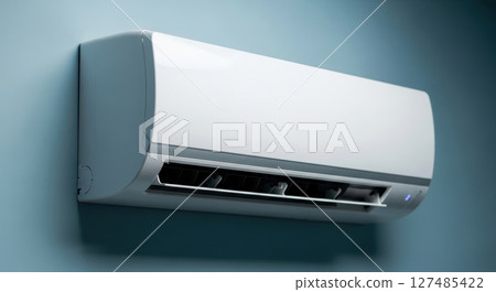 Modern white air conditioner unit mounted on a light blue wall Modern white air conditioner unit mounted on a light blue wall 127485422