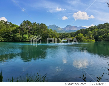 Beautiful lakeside with lush forest and Mt. Bandai 127486956