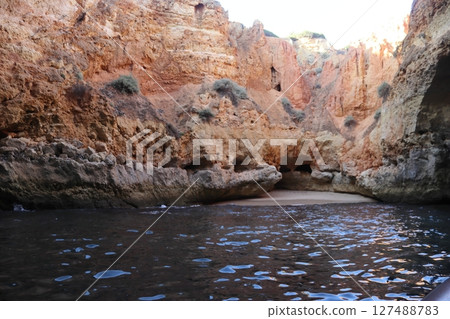 Hidden Sea Cave in Algarve, Portugal - Coastal Beauty 127488783