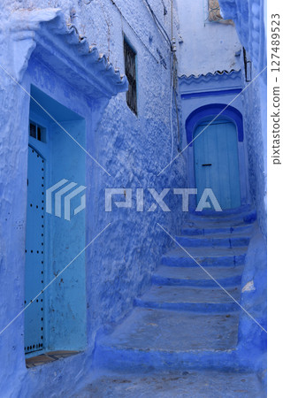 Streets and houses of Chefchaouen, Morocco painted in blue, medieval Unesco heritage Streets and houses of Chefchaouen, Morocco painted in blue, medieval Unesco heritage 127489523