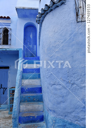 Streets and houses of Chefchaouen, Morocco painted in blue, medieval Unesco heritage Streets and houses of Chefchaouen, Morocco painted in blue, medieval Unesco heritage 127489533