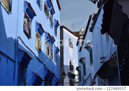 Streets and houses of Chefchaouen, Morocco painted in blue, medieval Unesco heritage 127489537