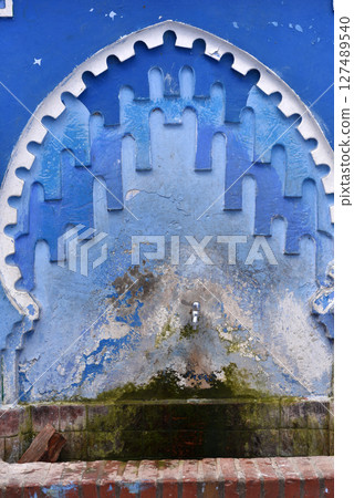 Streets and houses of Chefchaouen, Morocco painted in blue, medieval Unesco heritage Streets and houses of Chefchaouen, Morocco painted in blue, medieval Unesco heritage 127489540