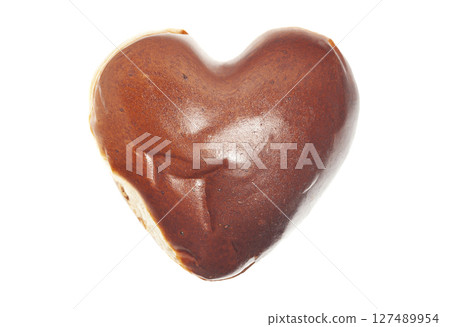 heart shaped fresh baked wheat bun isolated on white background heart shaped fresh baked wheat bun isolated on white background 127489954