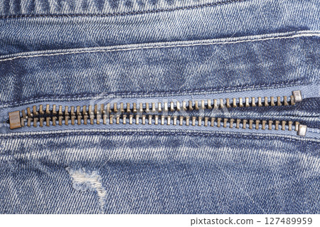 Blue jeans with zipper close up 127489959