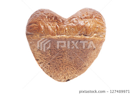 Bread in a heart shape isolated on white background. 127489971