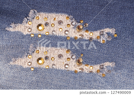 Blue jeans texture with rhinestones 127490009
