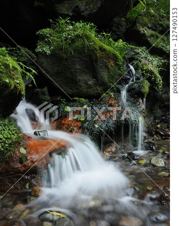 A waterfall overflowing with fresh water A waterfall overflowing with fresh water 127490153
