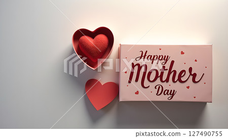 A heartwarming Mother's Day display of affection and love with a gift box and hearts 127490755