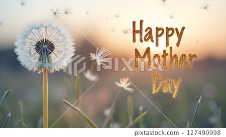 Dandelion Seed Head with Golden Mother's Day Greeting Against a Sunset Backdrop 127490998