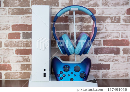 White gaming consoles the Xbox Series X and Xbox Series S. For play video games. White gaming consoles the Xbox Series X and Xbox Series S. For play video games. 127491036