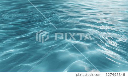 Calm water surface swaying in the light 127492846