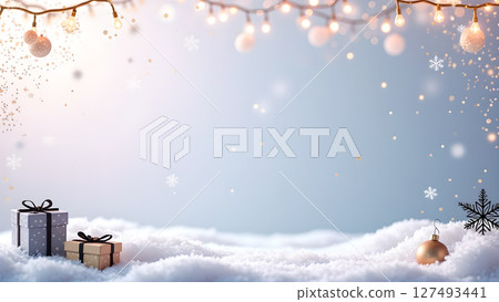 Magical winter background with soft lights, presents and snow for festive celebrations 127493441