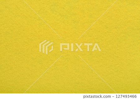 Yellow felt texture background - close-up of soft fabric surface. Seamless background, graphic design, scrapbooking, textile layouts, creative projects. Yellow felt texture background - close-up of soft fabric surface. Seamless background, graphic design, scrapbooking, textile layouts, creative projects. 127493466