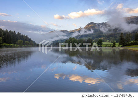 Water Mirror and Morning Fog in the Mountains Water Mirror and Morning Fog in the Mountains 127494363
