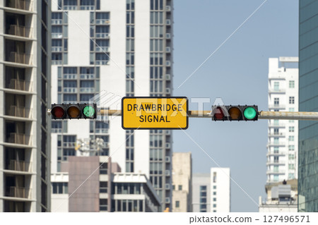 Overhead traffic lights high above street in Miami, Florida Overhead traffic lights high above street in Miami, Florida 127496571