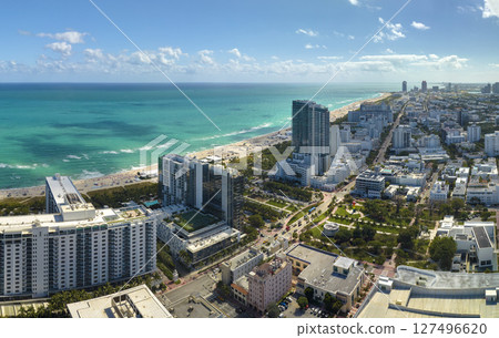 Miami Beach city with high luxury hotels and condos and sandy beachfront Miami Beach city with high luxury hotels and condos and sandy beachfront 127496620
