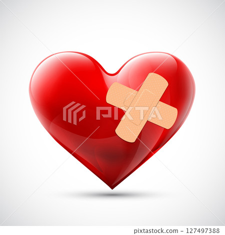 Red heart shape with medical plaster 127497388