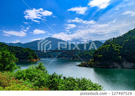 A spectacular panorama of Lake Miyagase and the mountains against the blue sky, Kiyokawa Village, Aiko District, Kanagawa Prefecture 127497529