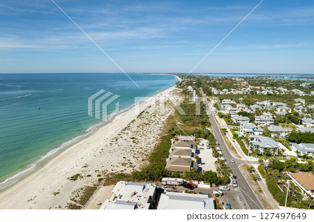 Large residential homes in island small town Boca Grande on Gasparilla Island in southwest Florida. American waterfront houses in rural US suburbs 127497649