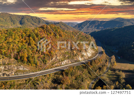 Highway road in USA. American freeway road with fast driving cars. Transportation infrastructure in North Carolina Appalachian mountains 127497751