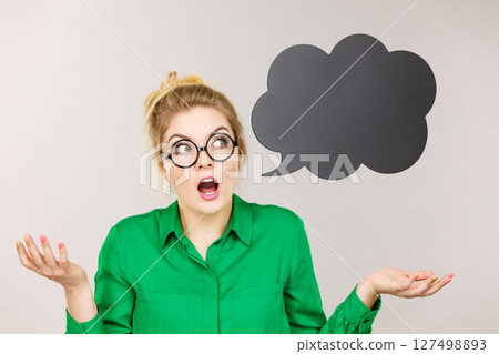 Shocked business woman with thinking bubble Shocked business woman with thinking bubble 127498893