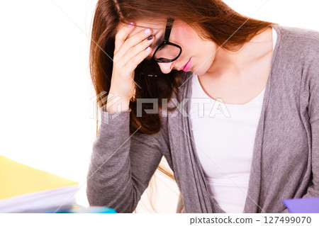 Woman suffering from headache migraine pain Woman suffering from headache migraine pain 127499070