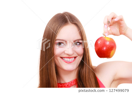 Woman charming girl colorful makeup holds apple fruit 127499079