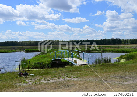 landscape with a bridge with clouds 127499251