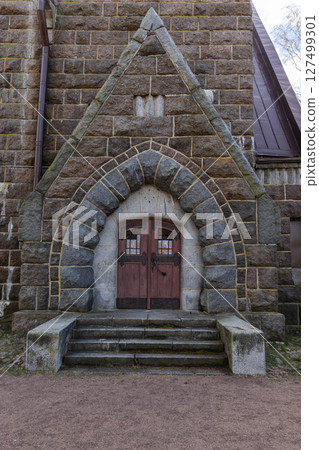 Back entrance of a church in Primorsk on a summer day Back entrance of a church in Primorsk on a summer day 127499301