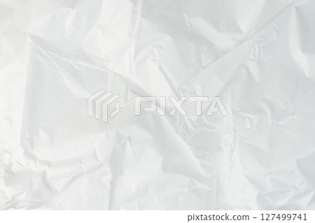Crumpled white paper background 127499741