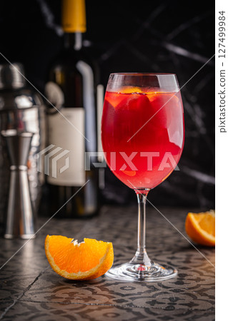 Glass of red wine spanish cocktail 127499984