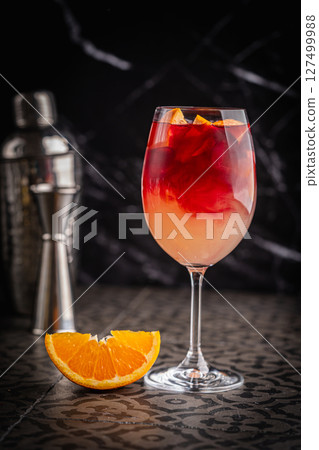 Glass of red wine spanish cocktail 127499988
