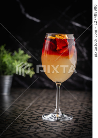 Glass of red wine spanish cocktail 127499990