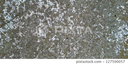 The surface of an old concrete slab. Traces of gray paint on concrete. The surface of an old concrete slab. Traces of gray paint on concrete. 127500057