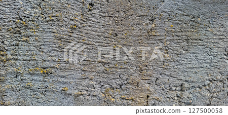 The surface of an old concrete slab. Traces of gray paint on concrete. The surface of an old concrete slab. Traces of gray paint on concrete. 127500058