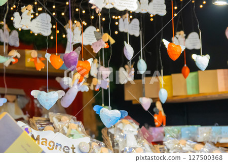 Christmas decorations with glass, angel, heart baubles colorful balls inside snow. 127500368