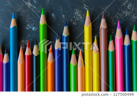 Color pencils on the natural structural background. Close up. Design concept. Color pencils on the natural structural background. Close up. Design concept. 127500499