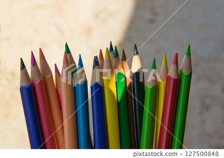 Much color pencils on the light natural background with sun. Close up. Design concept. Much color pencils on the light natural background with sun. Close up. Design concept. 127500848