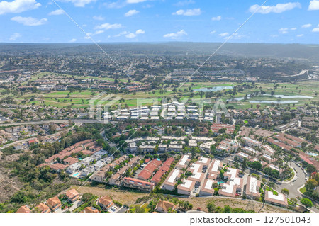 Aerial view of golf surrounded by villas and condos with golf in Carlsbad, North County San Diego Aerial view of golf surrounded by villas and condos with golf in Carlsbad, North County San Diego 127501043