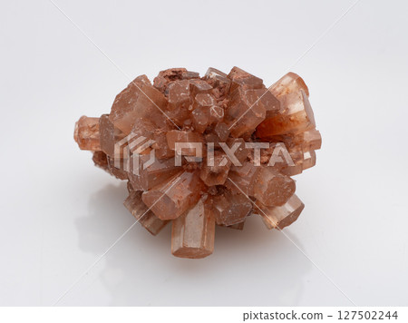 Natural Aragonite Crystal Cluster Formation, Peach Brown Toned Minerals, Geode Specimen, Studio Lighting, Geological Study, Raw Texture Natural Aragonite Crystal Cluster Formation, Peach Brown Toned Minerals, Geode Specimen, Studio Lighting, Geological Study, Raw Texture 127502244