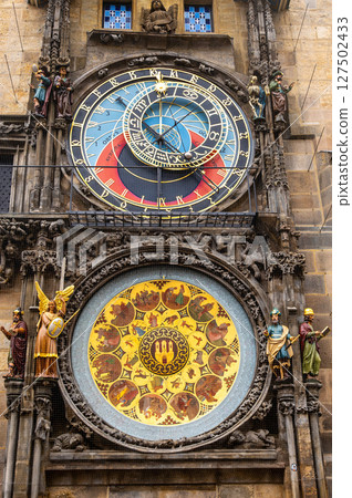 Prague, Czech Republic, August 5, 2023. The astronomical clock is one of the main attractions of the old town. Nice shot in vertical format. Travel destinations. Prague, Czech Republic, August 5, 2023. The astronomical clock is one of the main attractions of the old town. Nice shot in vertical format. Travel destinations. 127502433