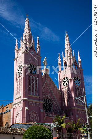 Pink church of Jerico. Shrine of Saint Mother Laura. Parish of the Heart of Mary. Heritage Town of Jerico located in the Department of Antioquia in Colombia. 127502447