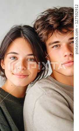 Close Portrait of Teen Siblings Smiling Together 127502912