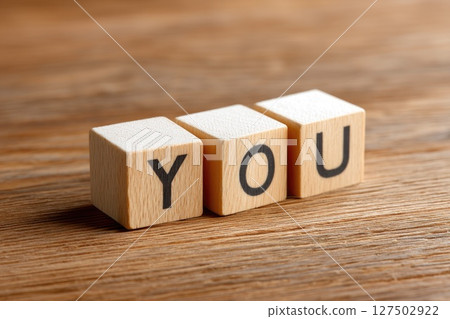 YOU Word on Wooden Cubes on Table YOU Word on Wooden Cubes on Table 127502922